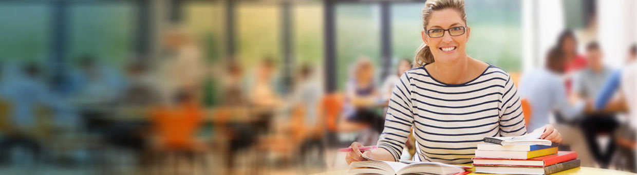 woman smiling with books